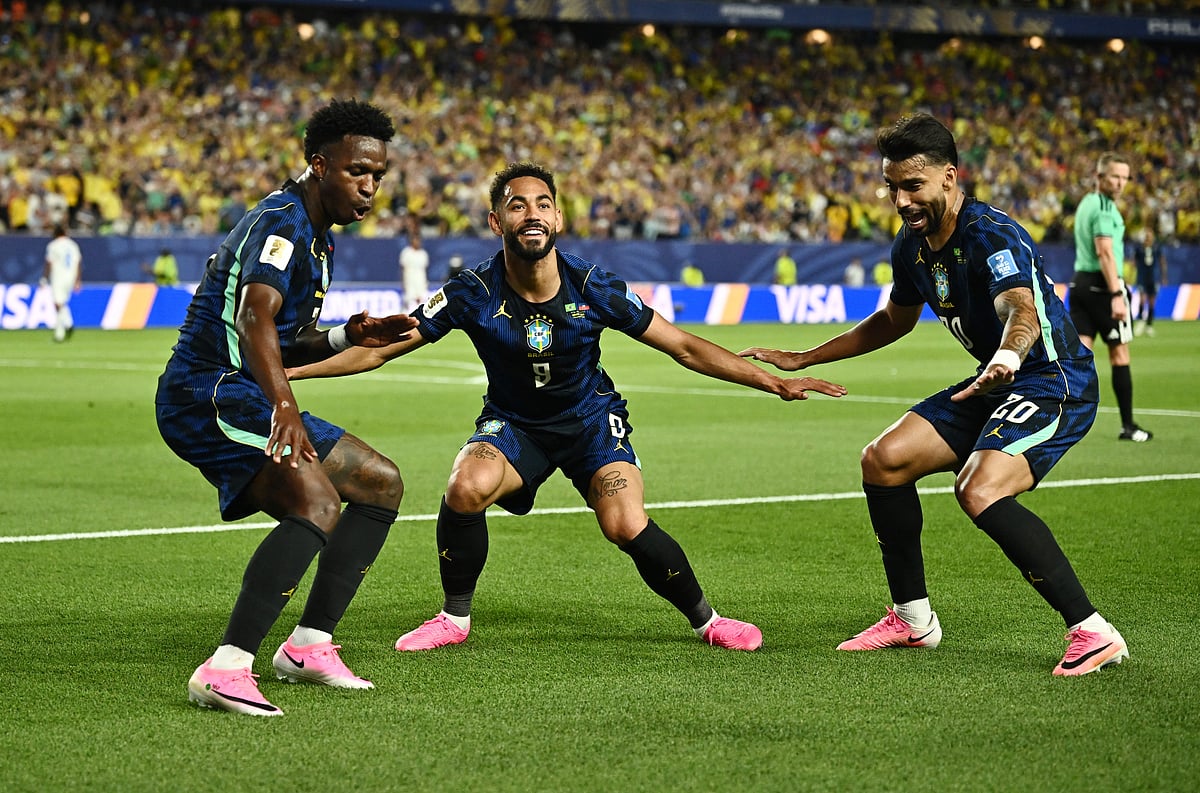 Football - FIFA World Cup 2026 - Group C - Brazil v Haiti - Philadelphia Stadium, Philadelphia, Pennsylvania, U.S. - June 19, 2026
Brazil's Matheus Cunha celebrates scoring their second goal with Vinicius Junior and Lucas Paqueta