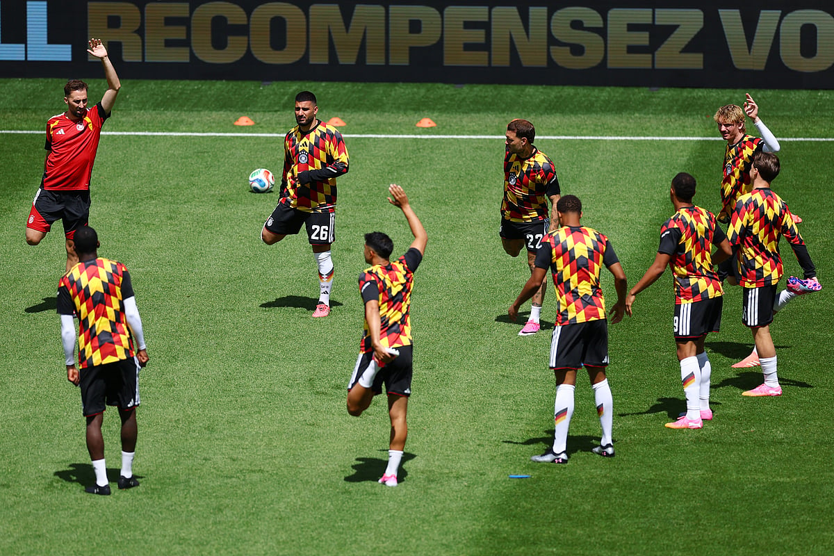 Football - FIFA World Cup 2026 - Group E - Germany v Ivory Coast - Toronto Stadium, Toronto, Canada - June 20, 2026
Germany's Deniz Undav, David Raum and Nick Woltemade during the warm up before the match