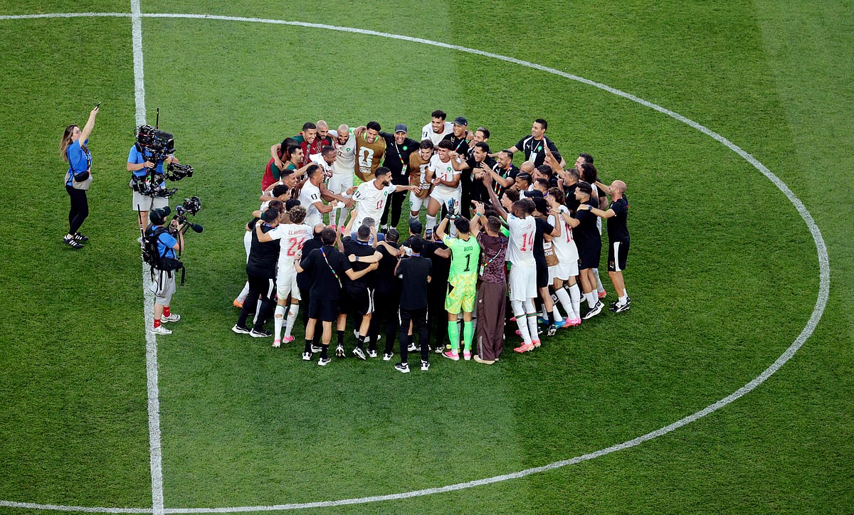 Football - FIFA World Cup 2026 - Group C - Scotland v Morocco - Boston Stadium, Foxborough, Massachusetts, U.S. - June 19, 2026
Morocco players celebrate in a huddle surrounding Morocco's Ismael Saibari at the end of the match