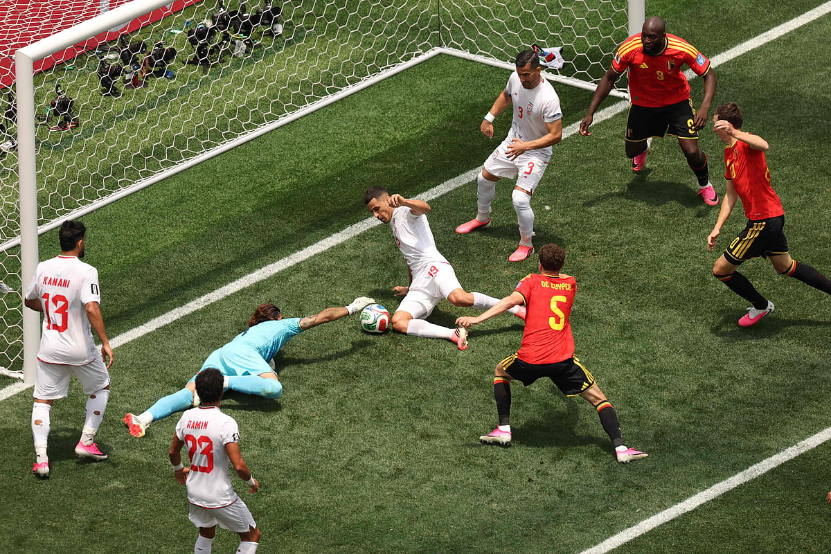 Iran's goalkeeper #01 Alireza Beiranvand makes a save during the 2026 World Cup Group G football match between Belgium and Iran at the Los Angeles Stadium in Inglewood on June 21, 2026.