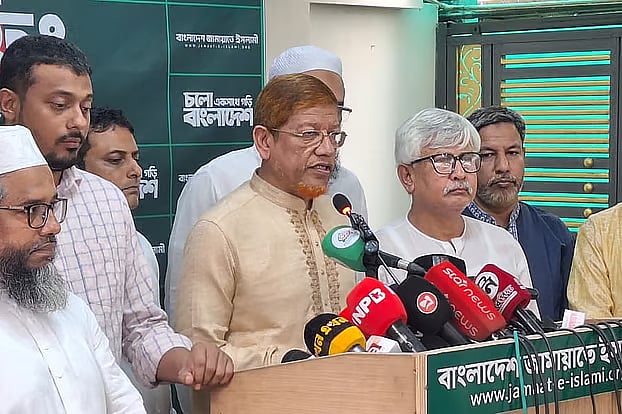 Jamaat-e-Islami Assistant Secretary General Hamidur Rahman Azad announces a rally of the 11-party alliance during an emergency press conference at the party's central office in Moghbazar on 22 June 2026.