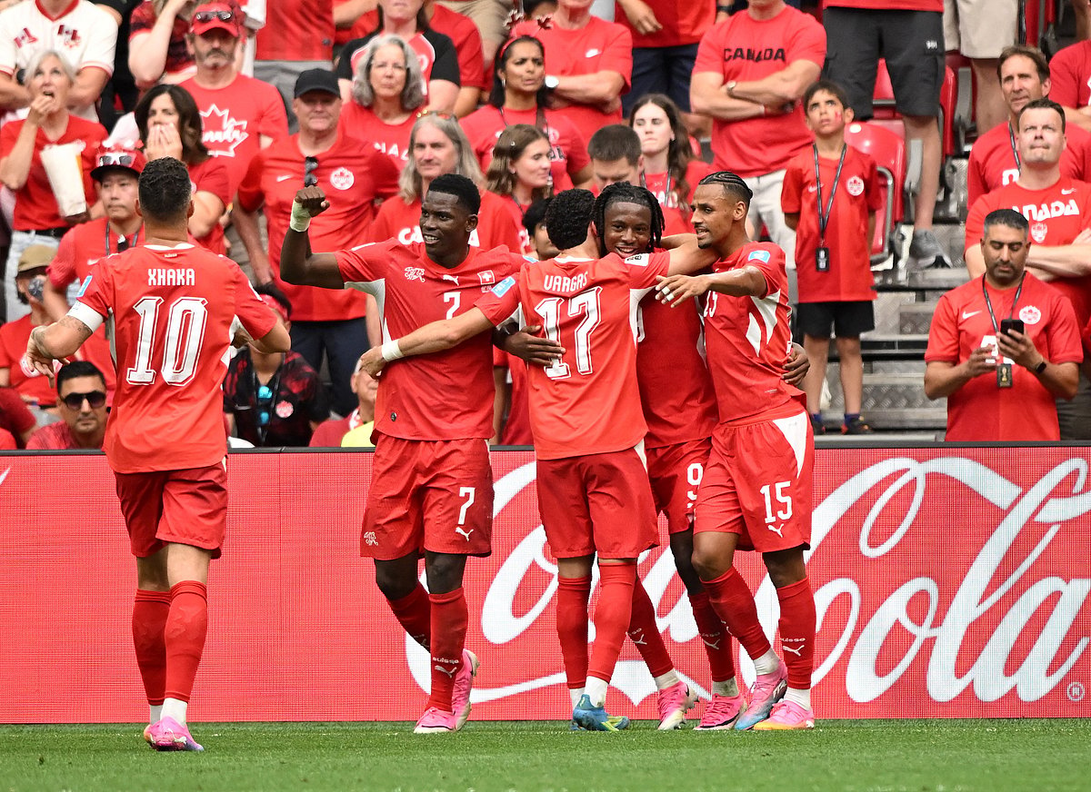 Switzerland's Johan Manzambi celebrates scoring their second goal with teammates against Canada at BC Place, Vancouver, Canada - 24 June, 2026