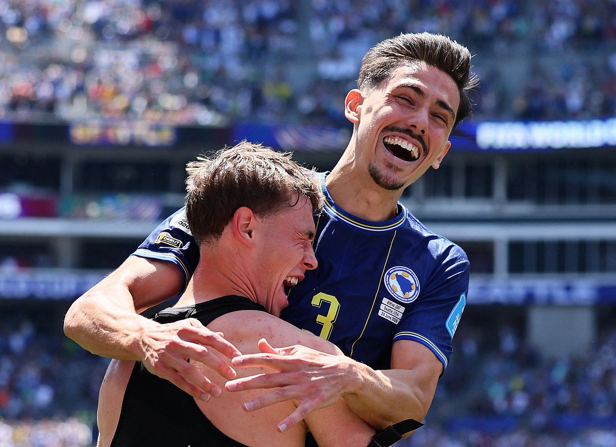 Bosnia and Herzegovina's Ermin Mahmic celebrates scoring their third goal with Dennis Hadzikadunic against Qatar - Seattle Stadium, Seattle, Washington, U.S. - June 24, 2026