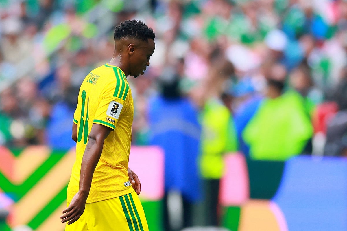 South Africa's Themba Zwane walks off the pitch after being shown a red card by referee Wilton Sampaio after a VAR review against Mexico at Estadio Azteca, Mexico City, Mexico - June 11, 2026