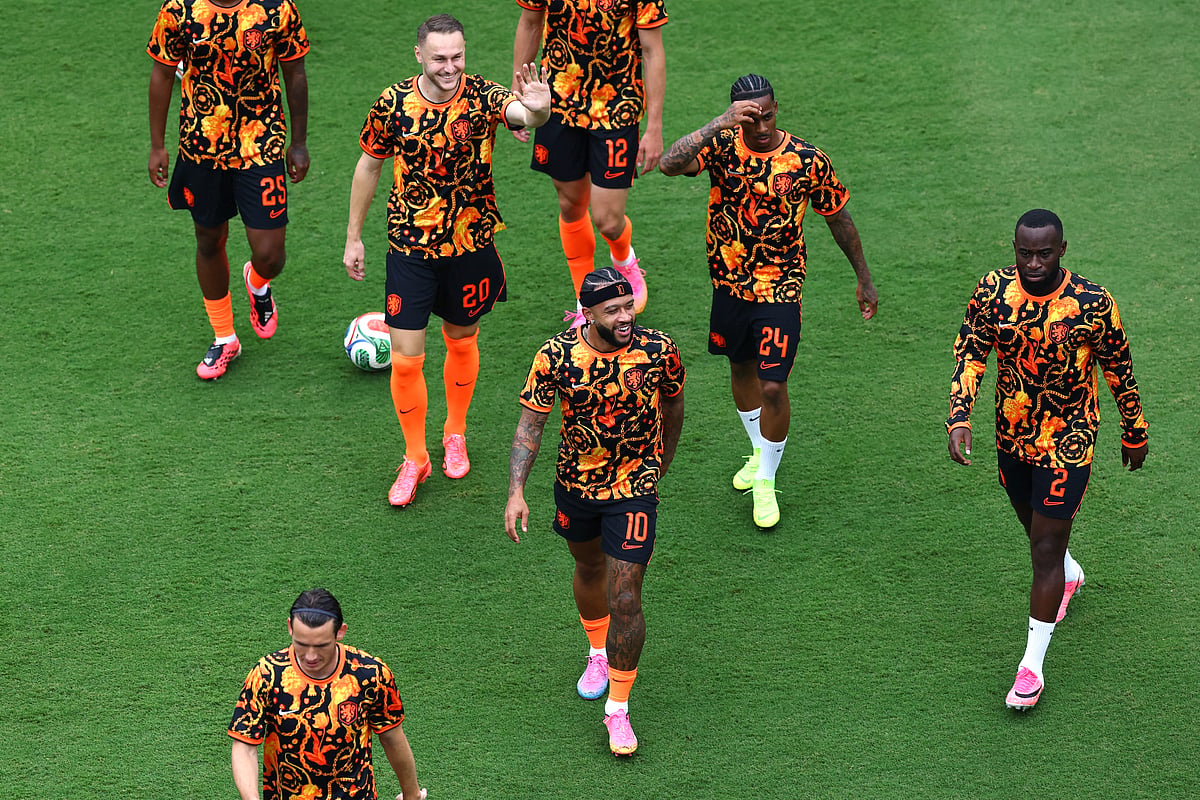 Football - FIFA World Cup 2026 - Group F - Tunisia v Netherlands - Kansas City Stadium, Kansas City, Missouri, U.S. - June 25, 2026
Netherlands' Memphis Depay, Lutsharel Geertruida, Crysencio Summerville, Teun Koopmeiners, and teammates during the warm up before the match