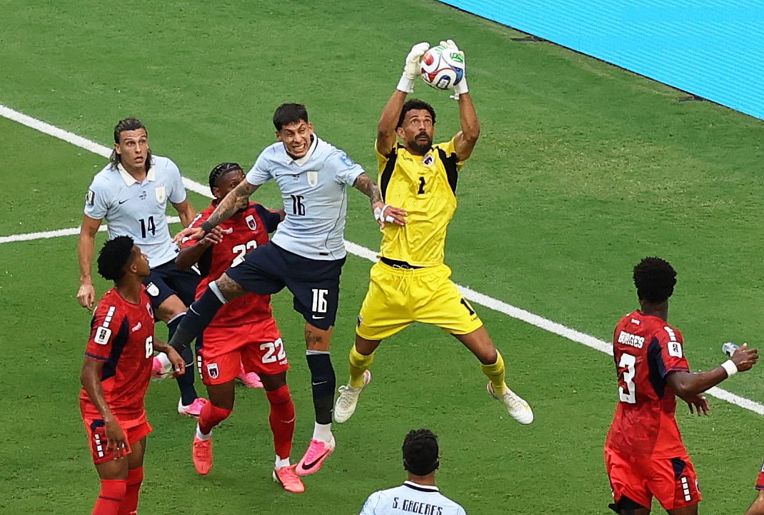 Football - FIFA World Cup 2026 - Group H -  Uruguay v Cape Verde - Miami Stadium, Miami Gardens, Florida, U.S. - June 21, 2026
Cape Verde's Vozinha in action with Uruguay's Mathias Olivera