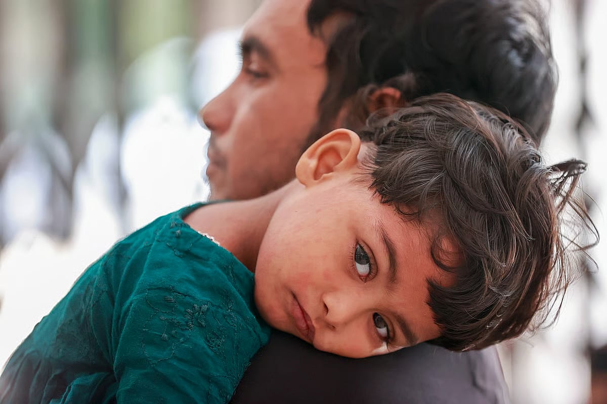 A child with measles symptoms brought for treatment at DNCC Covid-19 Dedicated Hospital at Mohakhali, Dhaka
