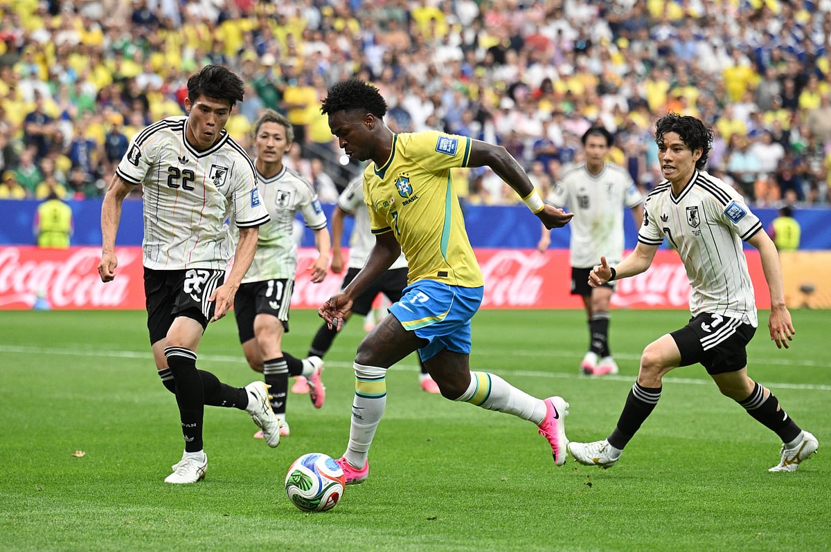 Football - FIFA World Cup 2026 - Round of 32 - Brazil v Japan - Houston Stadium, Houston, Texas, U.S. - June 29, 2026
Brazil's Vinicius Junior in action with Japan's Takehiro Tomiyasu