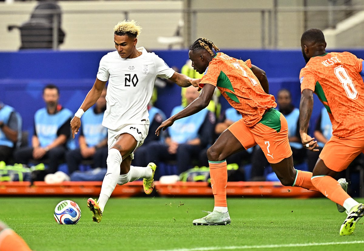 Norway's Antonio Nusa in action with Ivory Coast's Odilon Kossounou at Dallas Stadium, Arlington, Texas, US - 30 June, 2026.