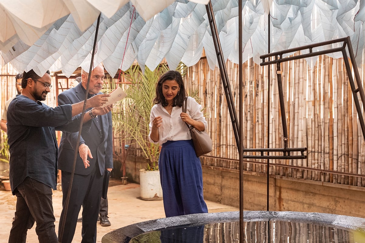 Architect Suvro Sovon Chowdhury explains the textile  architecture  design to the Country Director and Deputy Director of the British Council