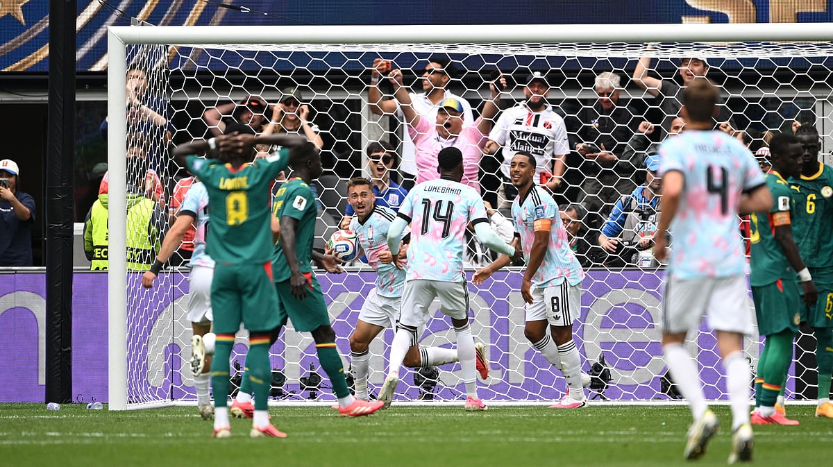 Belgium's Youri Tielemans celebrates scoring their second goal with Dodi Lukebakio and Timothy Castagne