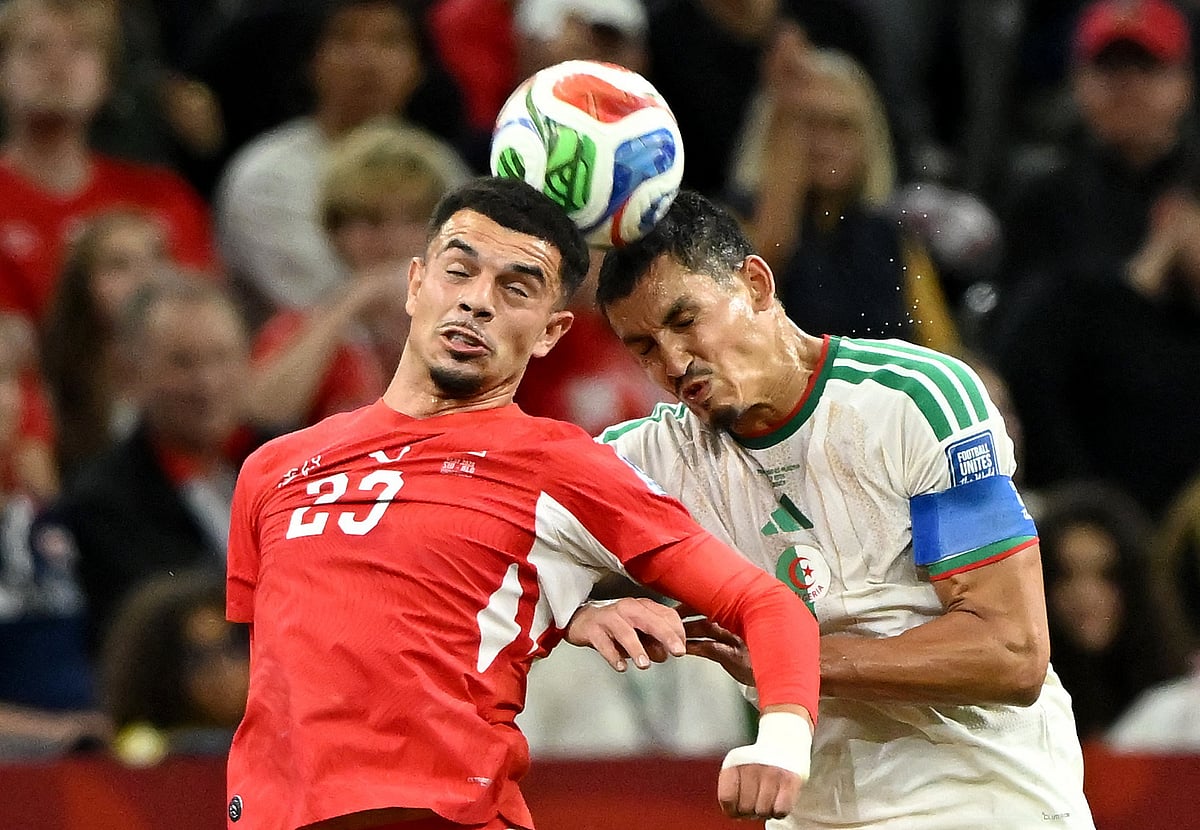 Switzerland's Zeki Amdouni in action with Algeria's Aissa Mandi at BC Place, Vancouver, Canada on 2 July, 2026.