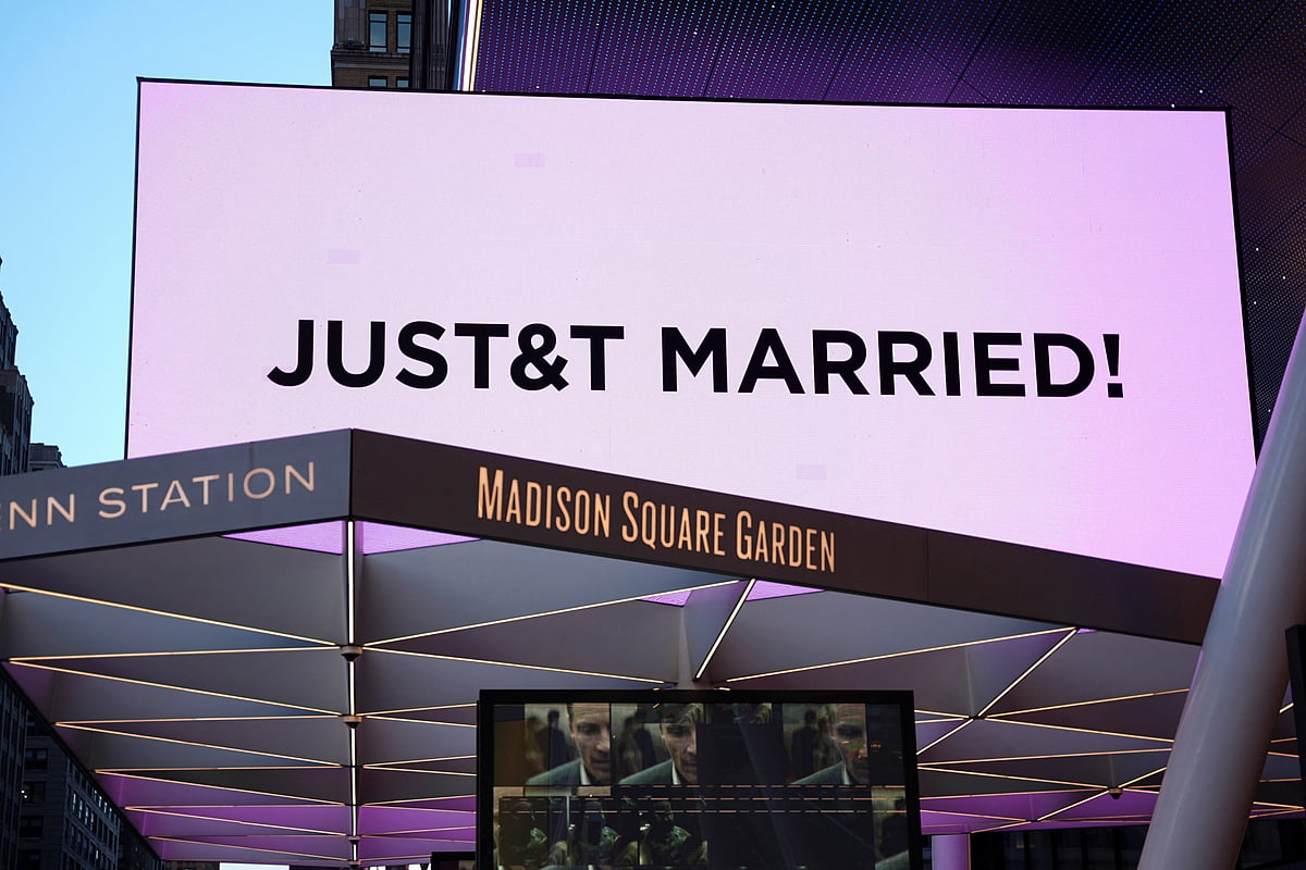 A screen displays a message referencing singer Taylor Swift and National Football League (NFL) player Travis Kelce outside Madison Square Garden, the venue for their reported wedding celebrations, in New York, US, 3 July, 2026.
