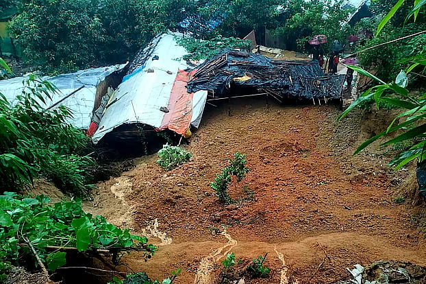 A house buried under a landslide in the Balukhali Rohingya refugee camp in Ukhiya, Cox's Bazar. The photo was taken on Sunday morning. 
