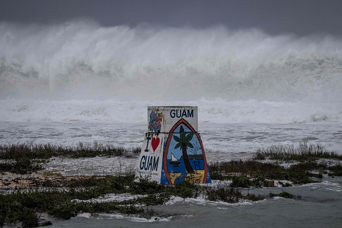 High waves crash against the coastline at a beach as the forecasted Super Typhoon Bavi approaches in Guam on 7 July, 2026.