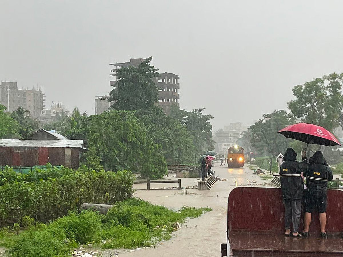 Railway tracks remain submerged in floodwater in the Sunnia Madrasah area of Sholoshahar, Chattogram. The photograph is taken in the morning of 8 July 2026