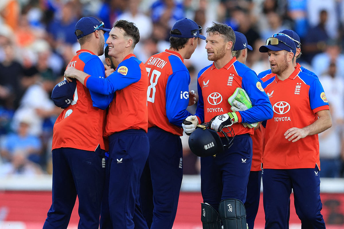 England’s Harry Brook (2L) celebrates with teammates as England win the third Twenty20 (T20) international cricket match between England and India at Trent Bridge in Nottingham, central England on 7 July 2026
