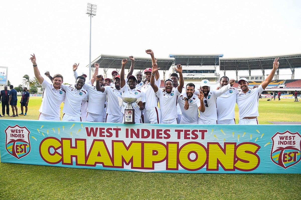 West Indies celebrate winning with the Sobers and Tissera trophy at the end of the fifth and final day of the second Test between Sri Lanka and West Indies at Vivian Richards Cricket Stadium in North Sound, Antigua and Barbuda, on 7 July, 2026.