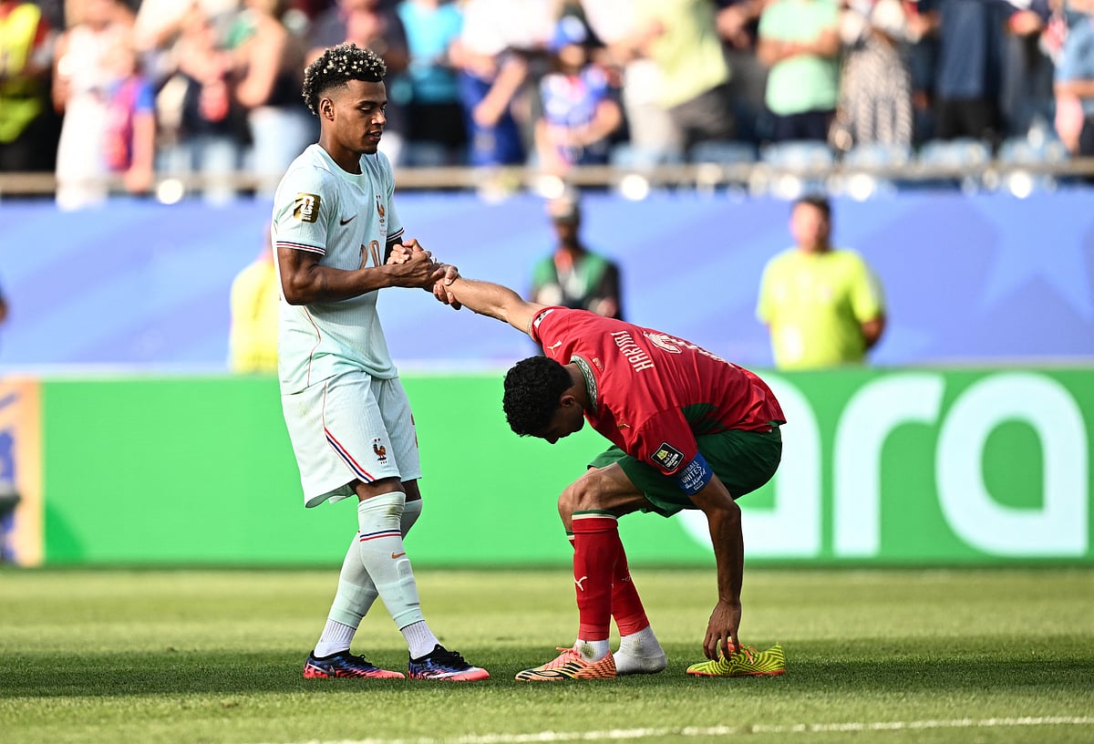 Football - FIFA World Cup 2026 - Quarter Final - France v Morocco - Boston Stadium, Foxborough, Massachusetts, U.S. - July 9, 2026
Morocco's Achraf Hakimi with France's Desire Doue after the match