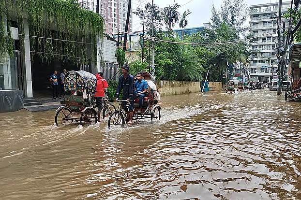 Knee-deep water inundates the Katalganj area of Chattogram following heavy rainfall.