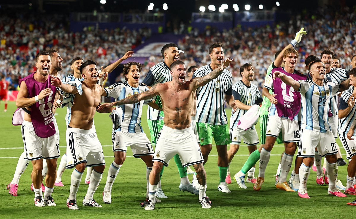 Argentina players celebrate after the match against Switzerland as Argentina qualify for the semi final stage of the World Cup