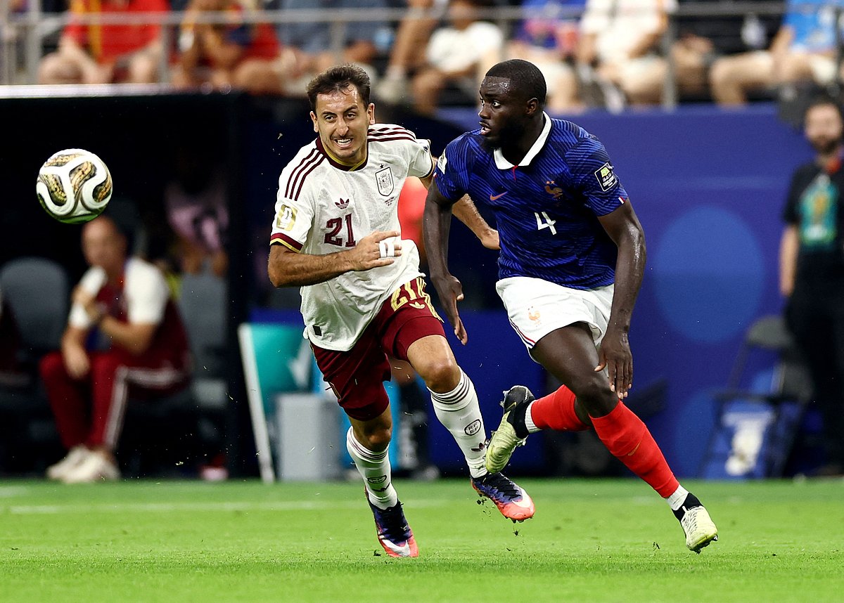 France's Dayot Upamecano in action with Spain's Mikel Oyarzabal at FIFA World Cup 2026 - Semi Final - France v Spain - Dallas Stadium, Arlington, Texas, US - 14 July, 2026.