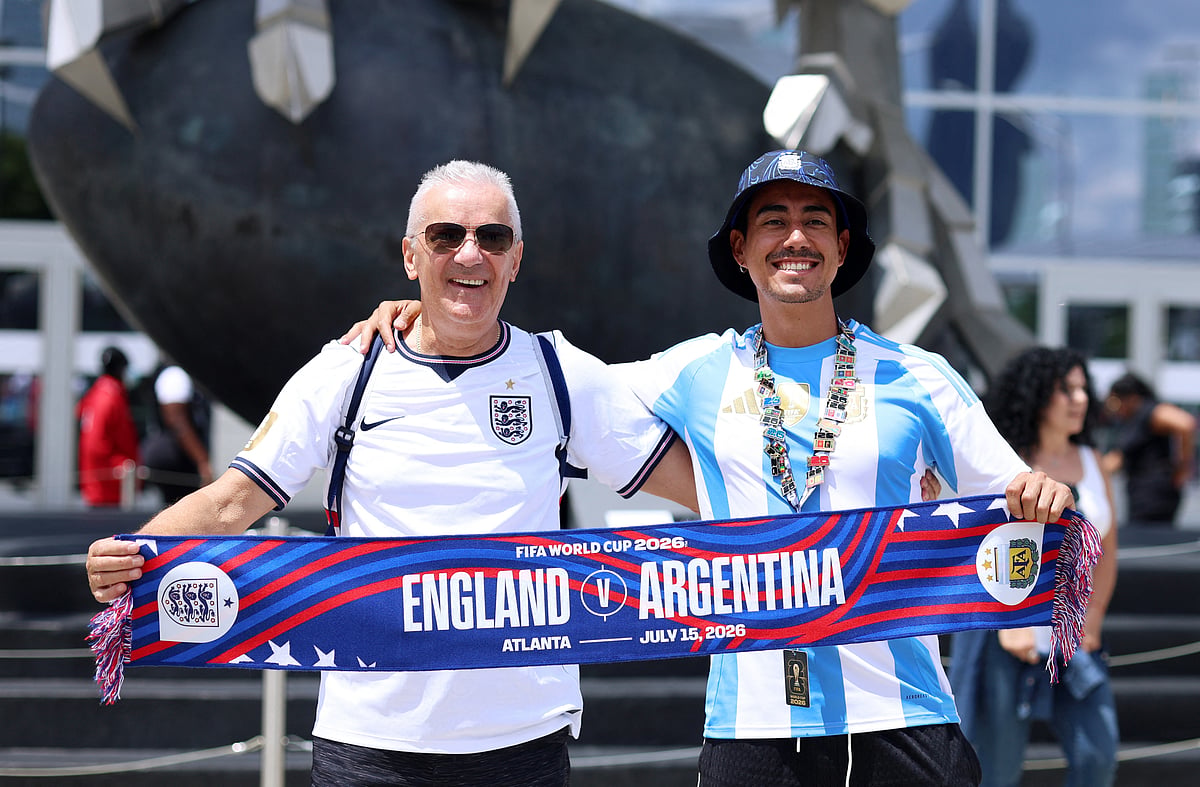 An England fan and an Argentina fan hold a matchday scarf outside the stadium before the match at FIFA World Cup 2026 - Semi Final - England v Argentina - Atlanta Stadium, Atlanta, Georgia, US - 15 July, 2026.