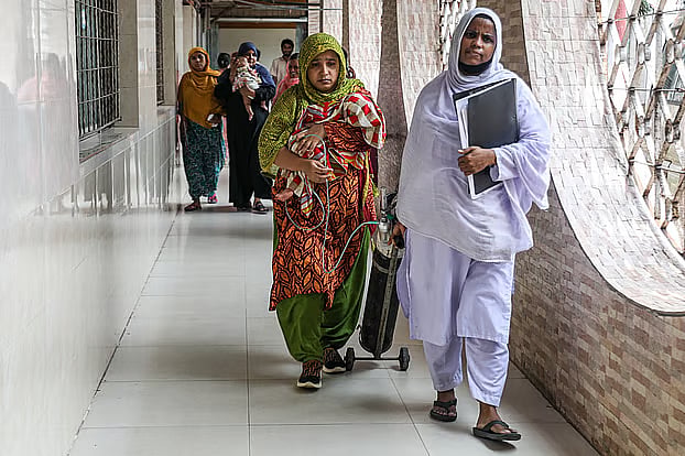 Children infected with measles and measles-like symptoms receive treatment at Bangladesh Shishu Hospital.