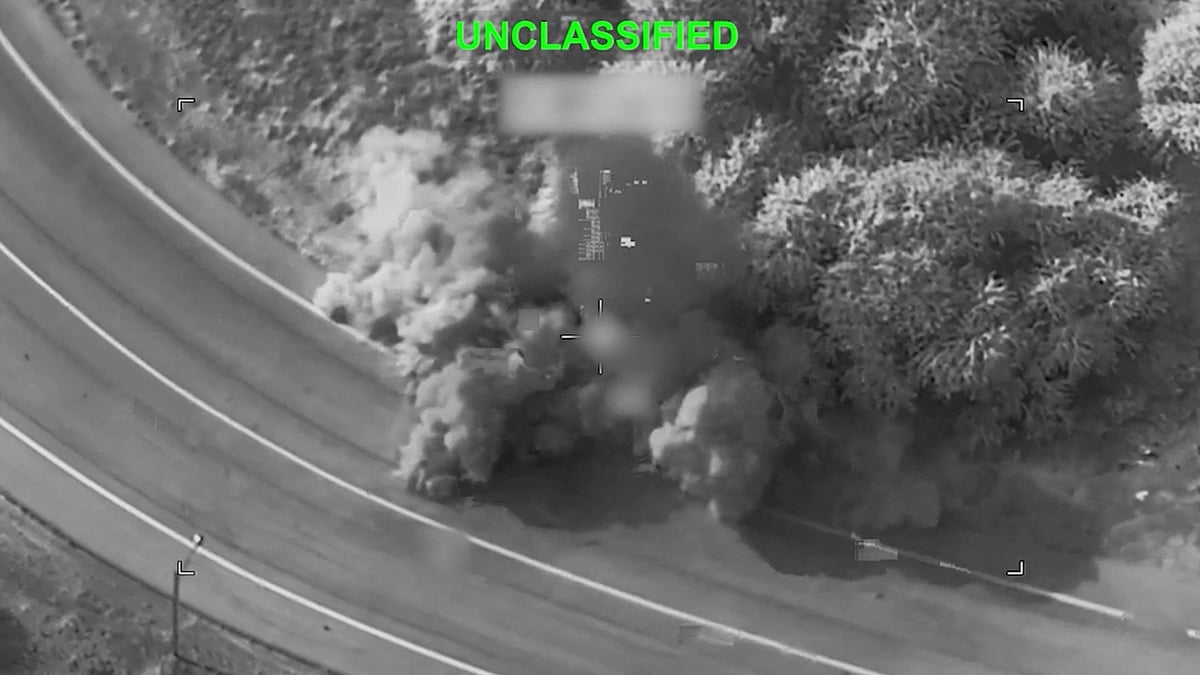 Smoke rises following a strike at an unknown location during what the US military says is its latest wave of strikes on Iran, hitting "Iranian military targets such as coastal surveillance and air defense sites, military logistics infrastructure, and maritime capabilities," in this still image taken from handout video released 16 July, 2026.