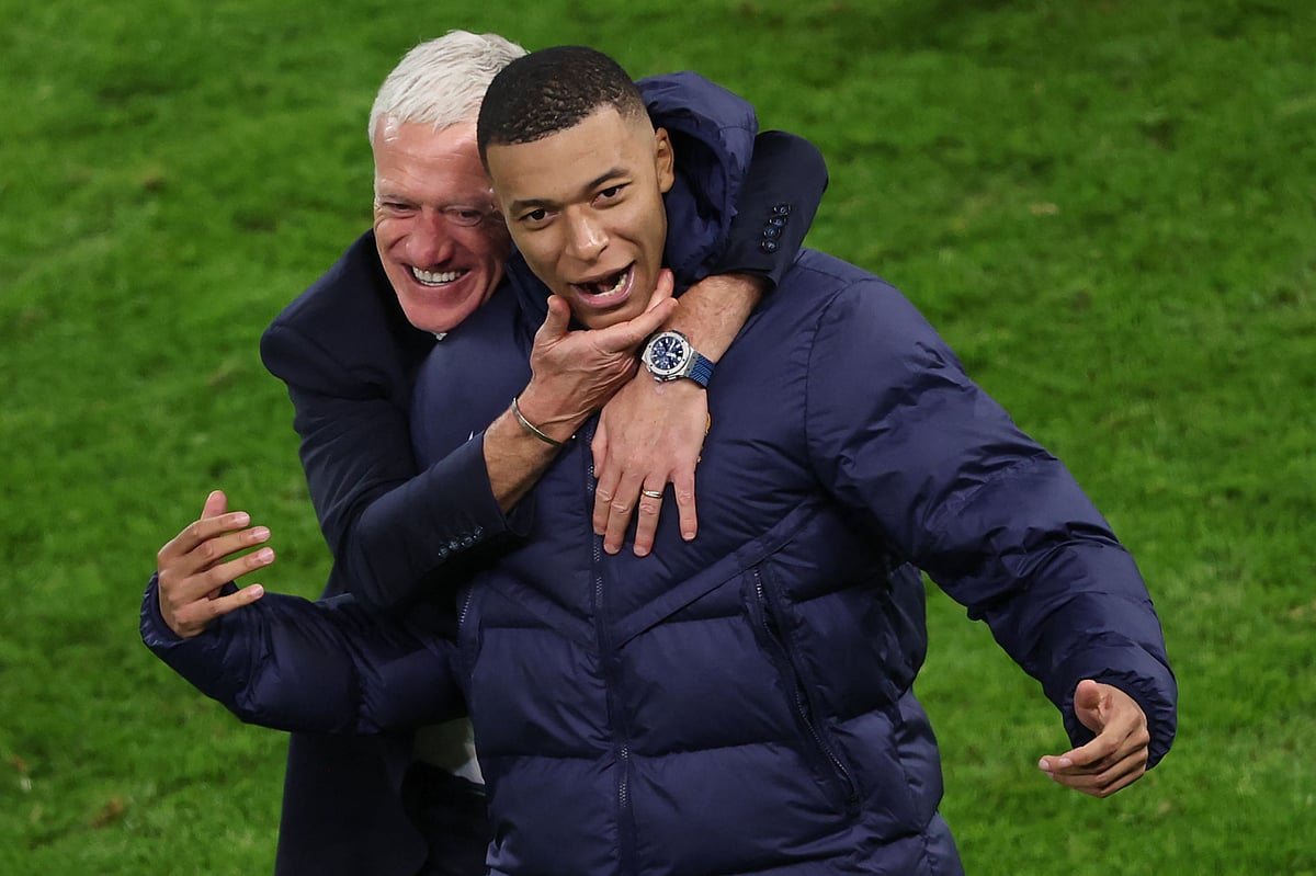 (FILES) France's head coach Didier Deschamps and France's forward #10 Kylian Mbappe celebrate after winning the UEFA Euro 2024 quarter-final football match between Portugal and France at the Volksparkstadion in Hamburg on 5 July, 2024.