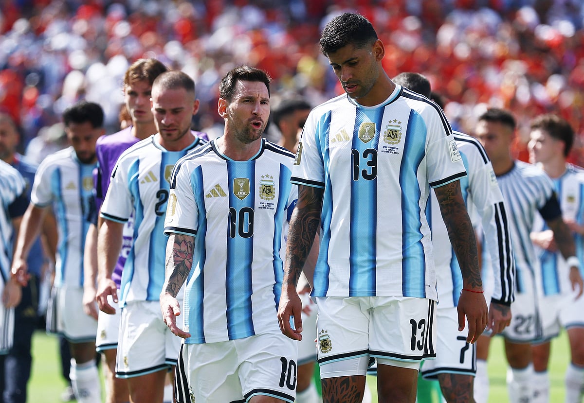 Argentina's Lionel Messi and Cristian Romero speak at half time at FIFA World Cup 2026 - Final - Spain v Argentina - New York/New Jersey Stadium, East Rutherford, New Jersey, US - 19 July, 2026.