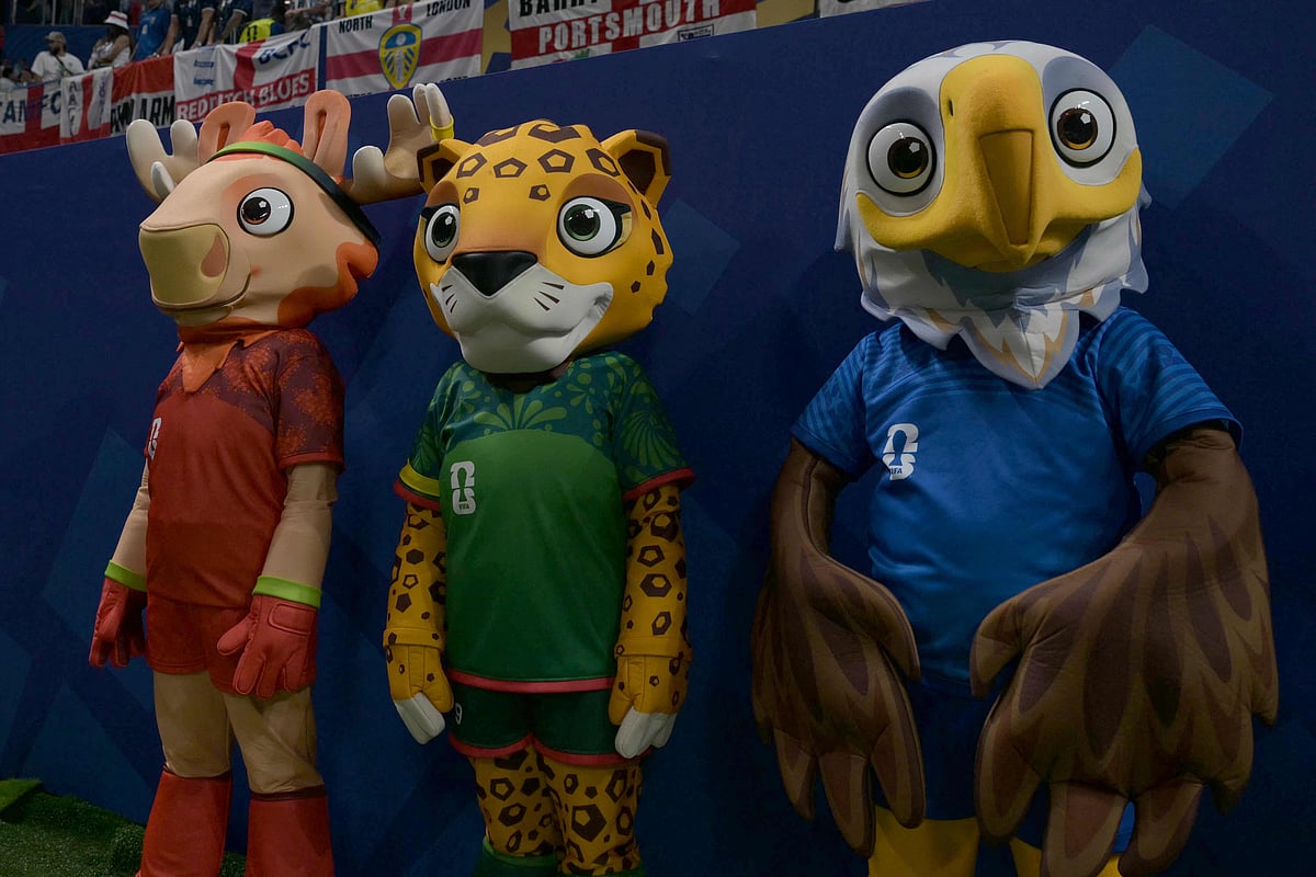 Mascots of 2026 World Cup, Maple the Moose representing Canada (L), Zayu the Jaguar representing Mexico (C) and Clutch the Bald Eagle representing the US (R), stand in the stadium ahead of the 2026 World Cup football tournament semi-final match between England and Argentina at the Atlanta Stadium in Atlanta on 15 July 2026