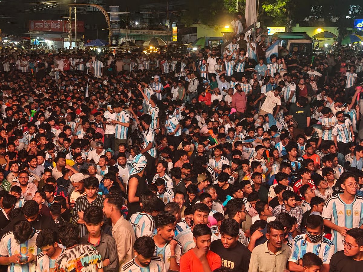Spectators gather at Kazir Dewri in Chattogram before kickoff to watch the World Cup final on a giant screen.