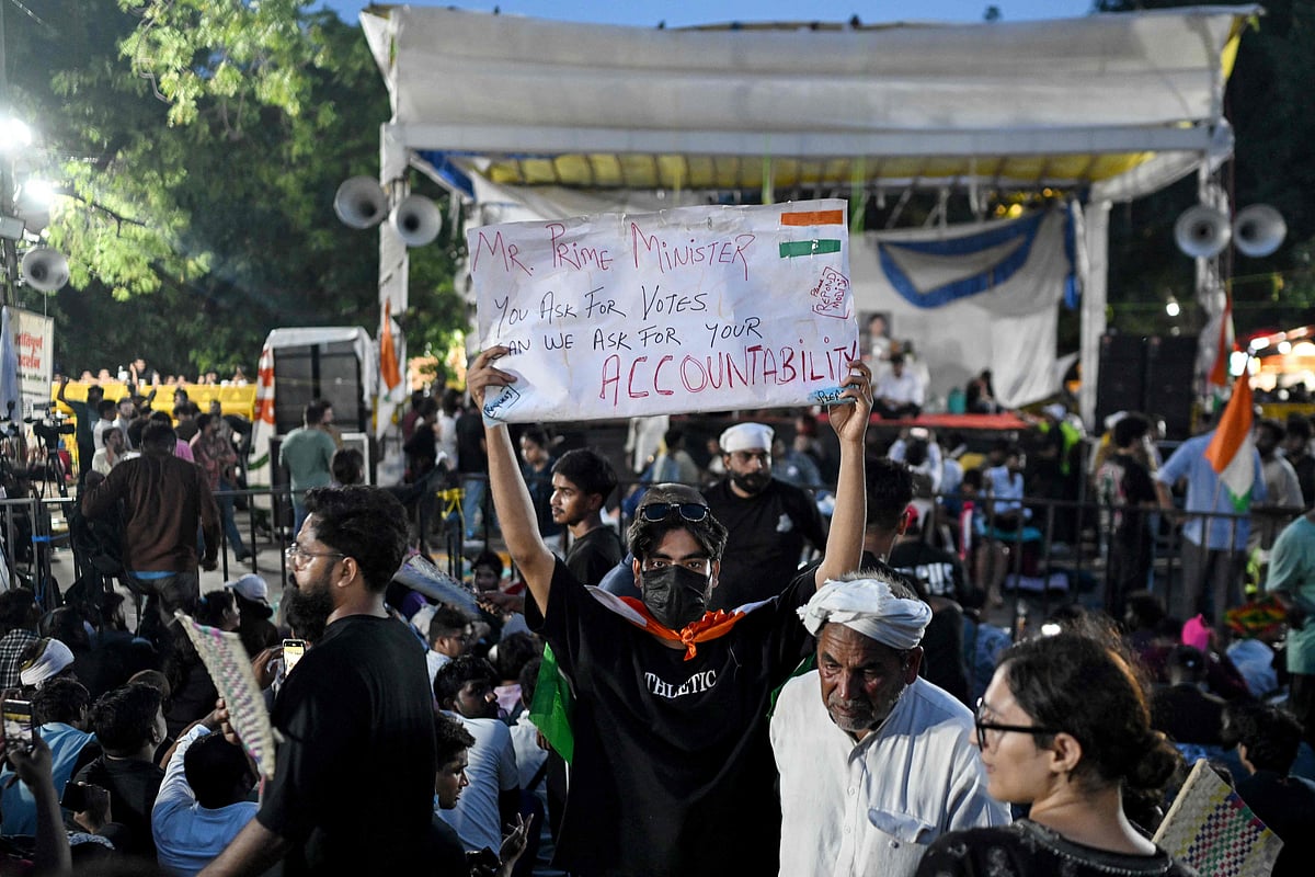Cockroach Janta Party (CJP) supporters take part in an ongoing protest demanding the resignation of India’s Education Minister Dharmendra Pradhan over alleged NEET exam irregularities, at the Jantar Mantar in New Delhi on 22 July 2026