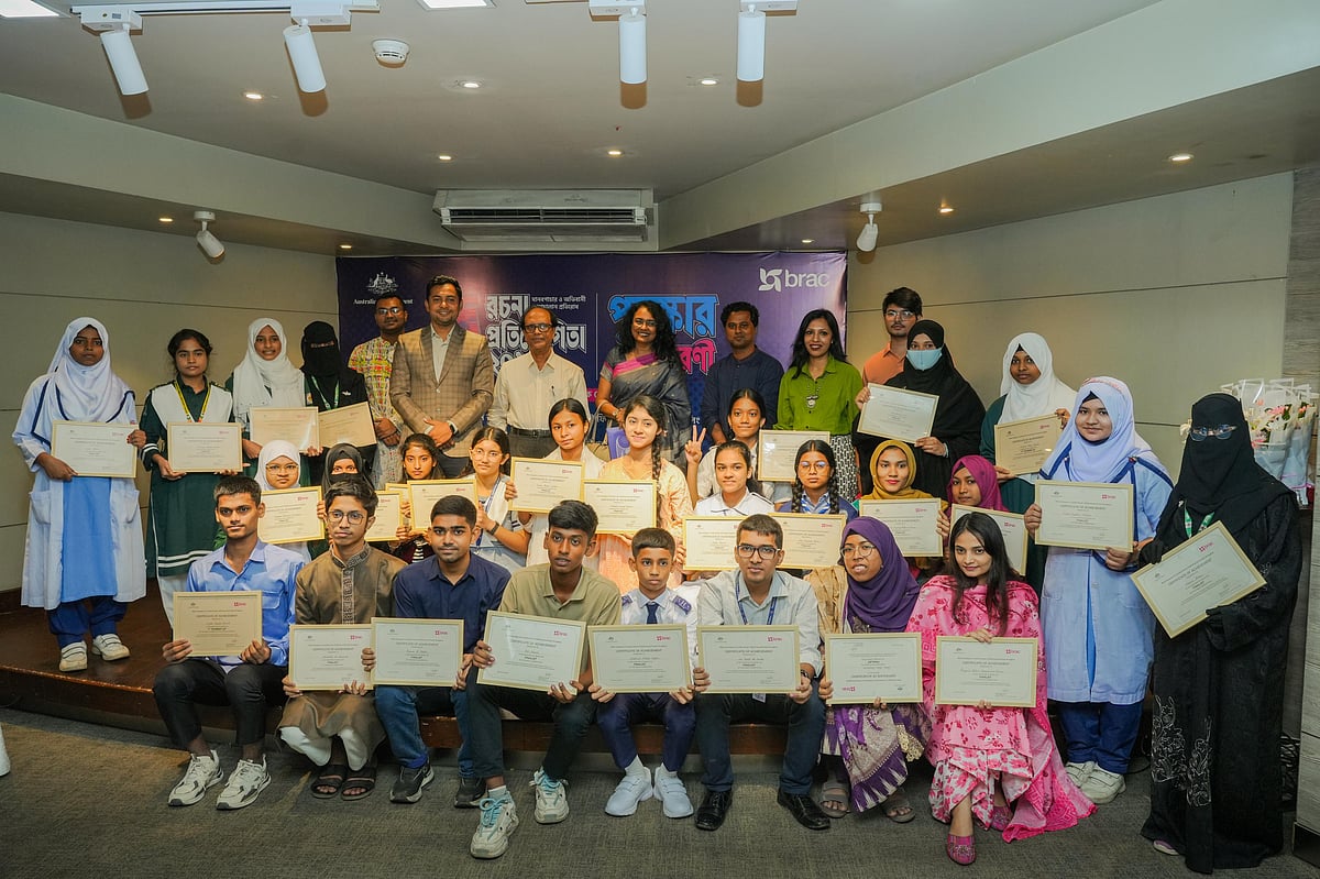Winners of a nationwide essay competition on preventing human trafficking and migrant smuggling receive awards and certificates at the BRAC Centre in Mohakhali, Dhaka, on Thursday, 23 July 2026.