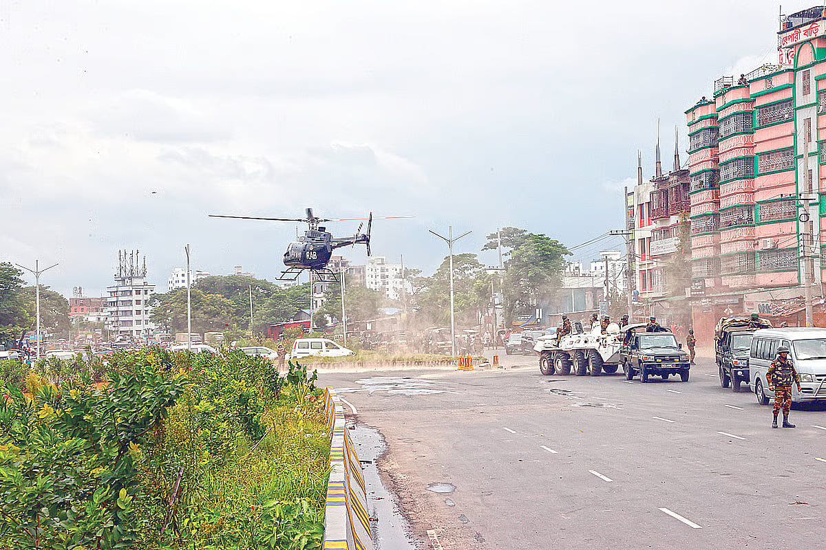 A RAB helicopter flies over Matuail in the capital during operations to suppress protesters on 22 July 2024.
