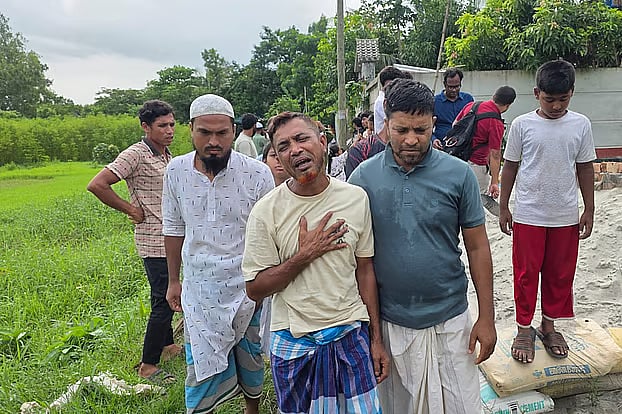 Father Ali Mia breaks down in tears upon hearing the news of his son Md Apon's death in a fire in South Africa. The picture is taken from  Narayanganj Sadar upazila, Alirtek union, Koker Char