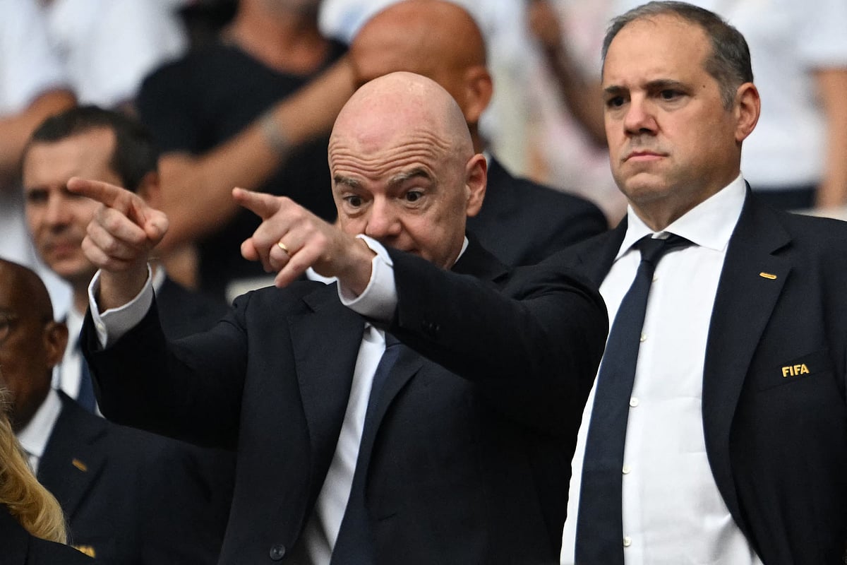 FIFA President Gianni Infantino (L) and CONCACAF President Victor Montagliani attend the 2026 World Cup football tournament quarter-final match between Norway and England at Miami Stadium in Miami on July 11, 2026. CONCACAF, which comprises 41 football associations from North America, Central America and the Caribbean, formally rejected FIFAs proposal to open up the organisation to private investors on Thursday, it announced following a meeting of its members.