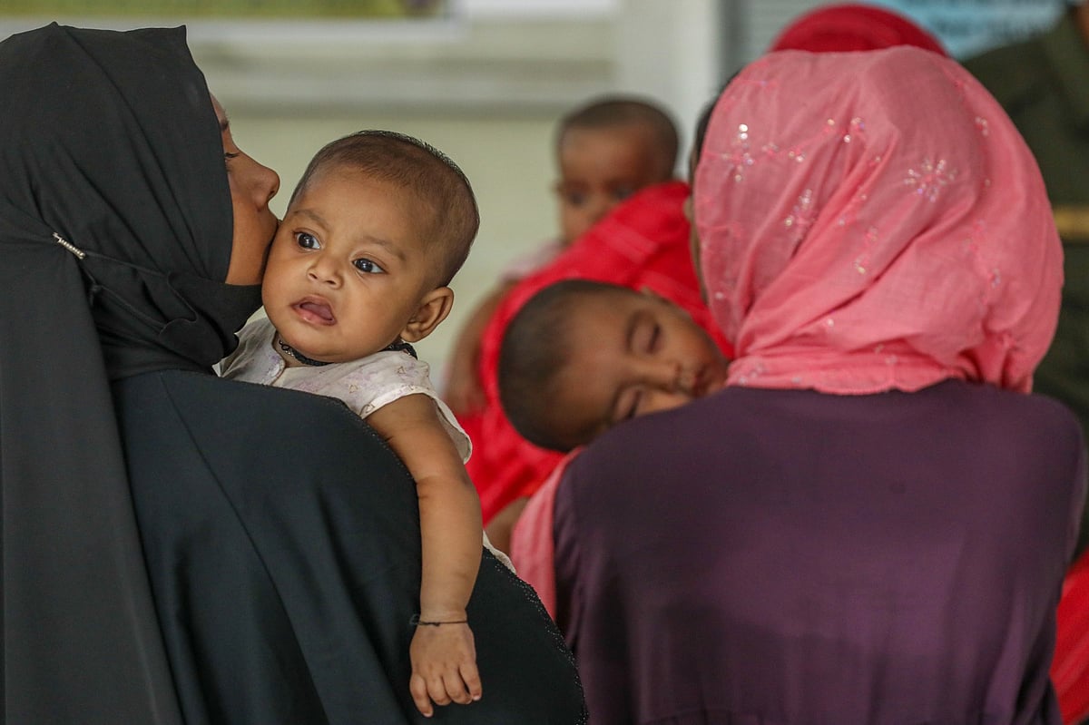 Parents bring their children who show measles symptoms at DNCC Dedicated COVID Hospital, Mohakhali, Dhaka on 3 August 2026
