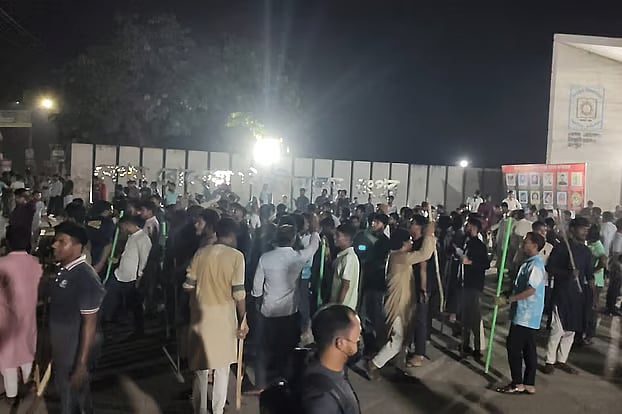 Tensions spread across the campus following a clash between Chhatra Dal and Chhatra Shibir at Begum Rokeya University in Rangpur. The scene in front of the university’s main gate on Monday night.