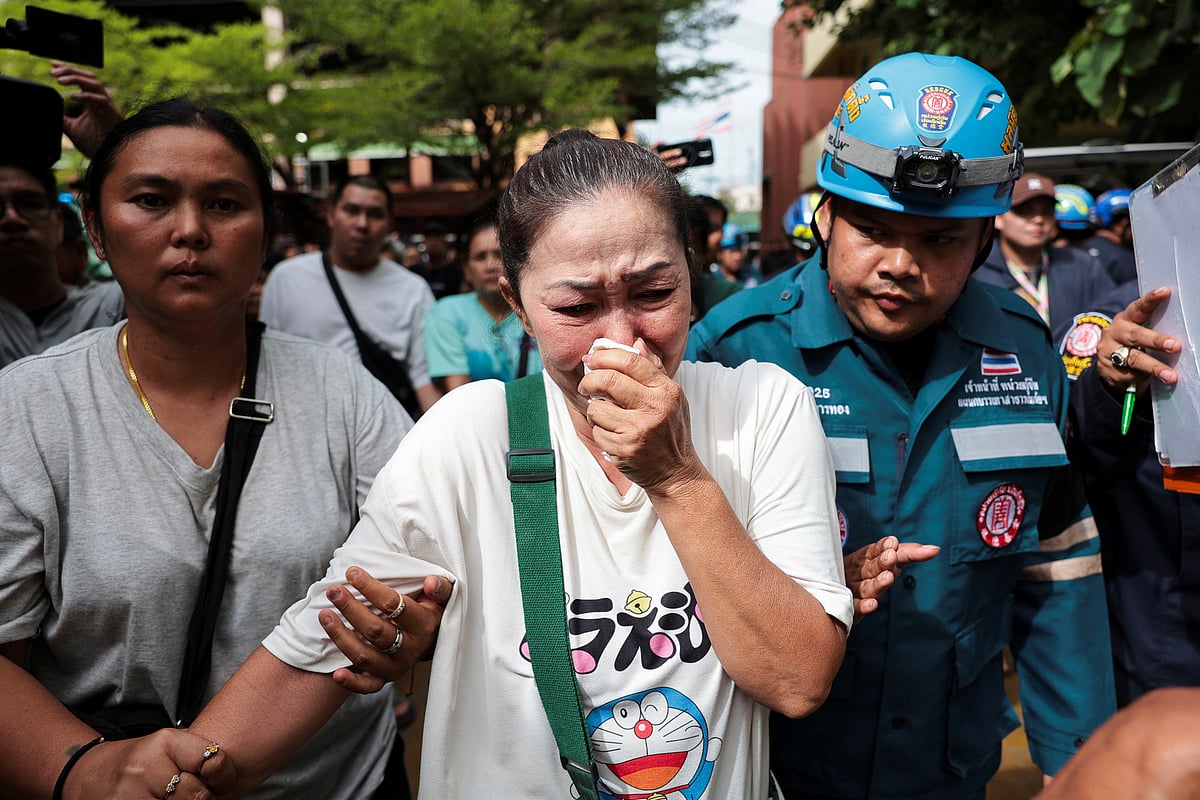 A relative of a victim reacts at Debsirin Nonthaburi School following the shooting incident that took place at the school, in Bang Kruai district, Nonthaburi province on the outskirts of Bangkok, Thailand, on 7 August, 2026