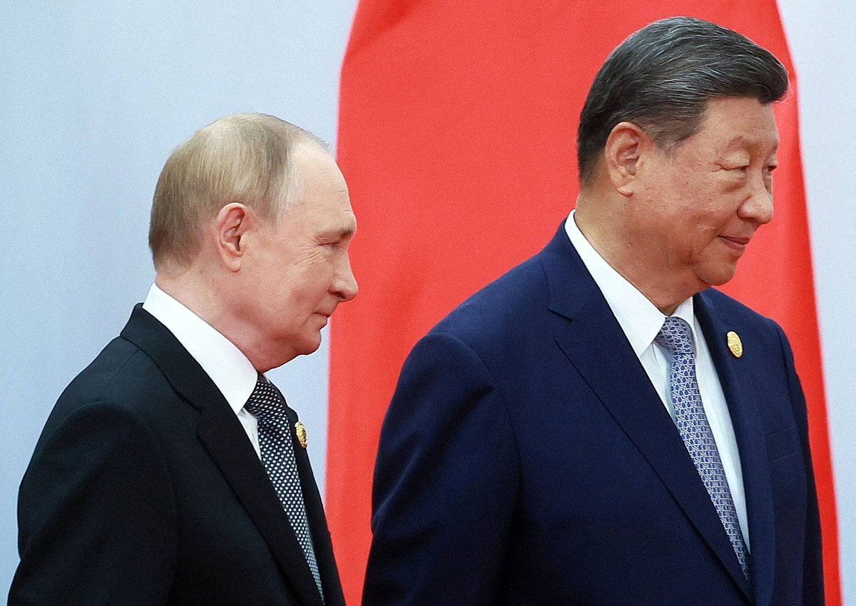 Russian President Vladimir Putin and Chinese President Xi Jinping take part in a photo ceremony at the Shanghai Cooperation Organisation (SCO) summit in Tianjin, China, 1 September 2025.