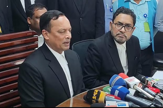 Attorney General Md Ruhul Quddus Kazal briefs reporters at his office around on 8 September.