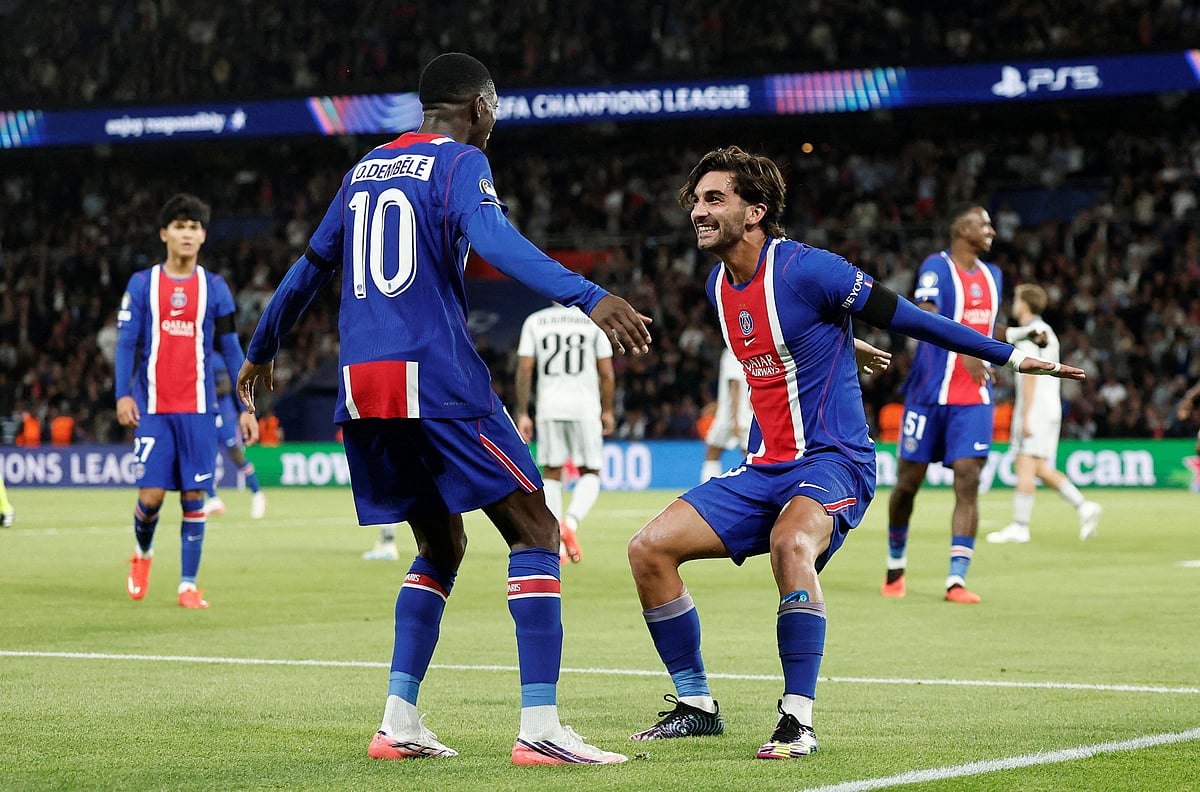 Paris St Germain's Ferran Torres celebrates scoring their fifth goal with Ousmane Dembele in the UEFA Champions League opening match against Slovan Bratislava at Parc des Princes, Paris, France on 9 September 2026