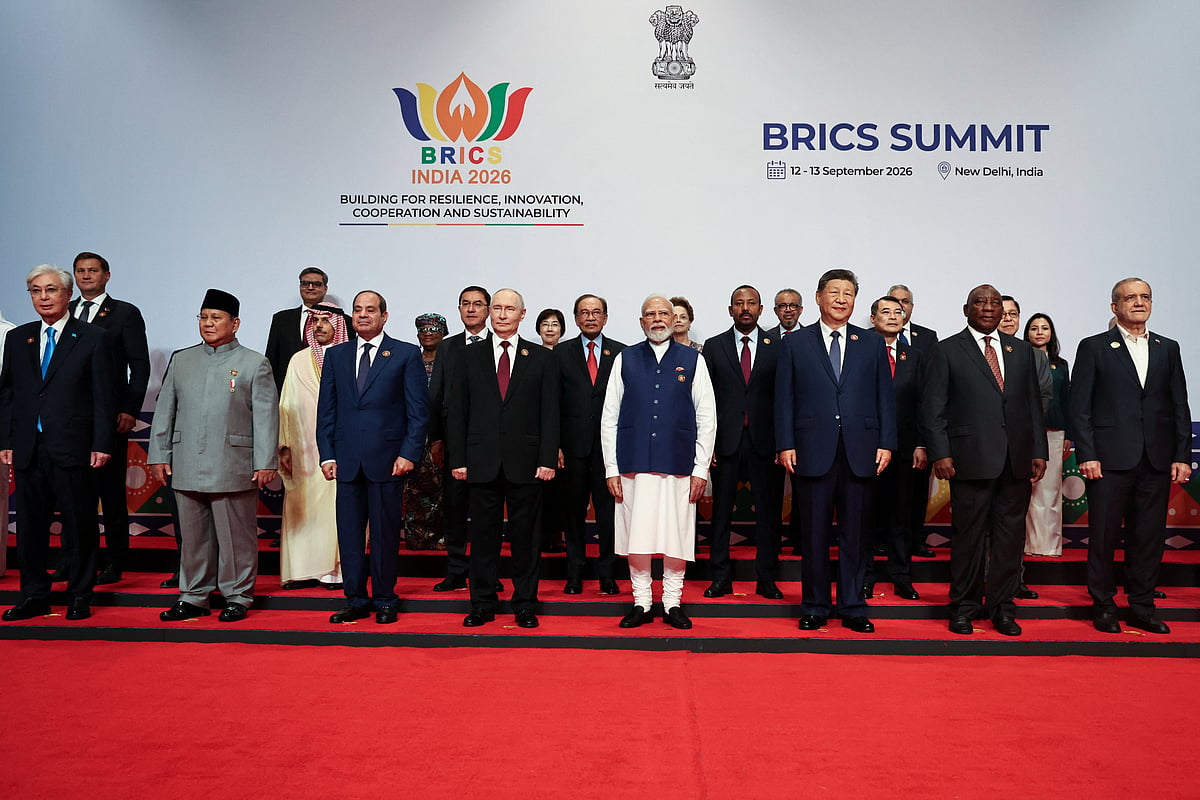 Heads of delegations, including Kazakh President Kassym-Jomart Tokayev, Indonesian President Prabowo Subianto, Egyptian President Abdel Fattah al-Sisi, Russian President Vladimir Putin, Indian Prime Minister Narendra Modi, Chinese President Xi Jinping, South African President Cyril Ramaphosa, Iranian President Masoud Pezeshkian, Saudi Foreign Minister Prince Faisal bin Farhan Al-Saud, Uzbekistan Deputy Prime Minister Jamshid Kuchkarov, Malaysian Prime Minister Anwar Ibrahim, Ethiopian Prime Minister Abiy Ahmed, Vietnam's Prime Minister Le Minh Hung, pose for a family photo on day two of the BRICS Summit in New Delhi, India, 13 September, 2026.