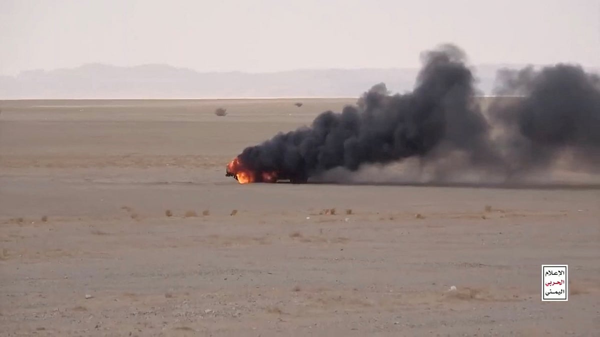 A vehicle burns after being attacked by Houthis during fighting with Saudi-backed forces at a location given as Al Jawf, Yemen, in this still image taken from a handout video released 9 September, 2026.