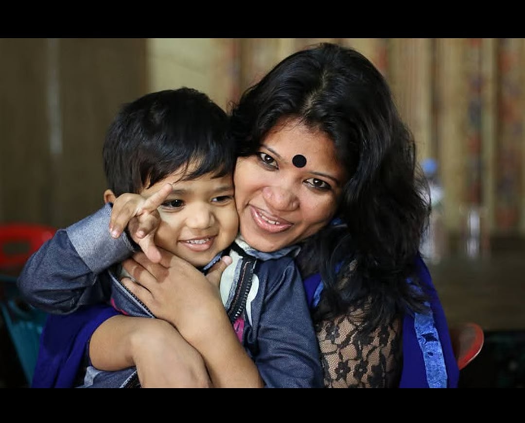 Young Apratim with his mother Nahida Begum.