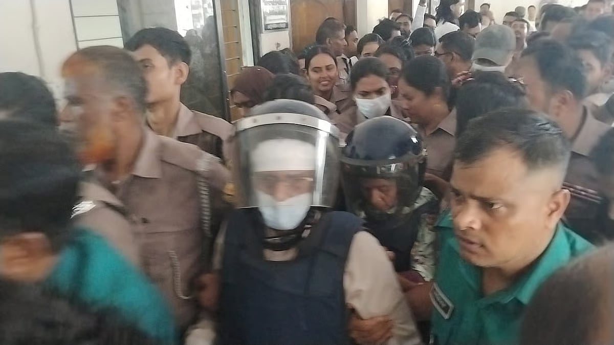 MP Gazi Nazrul Islam and his first wife Maksuda are being taken to a Dhaka court on 21 September 2026