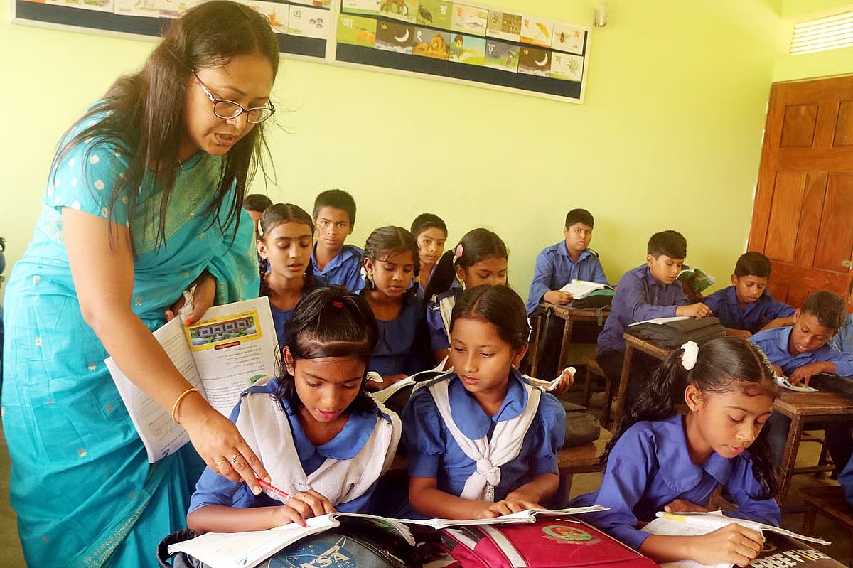 A teacher conducts a class at a government primary school