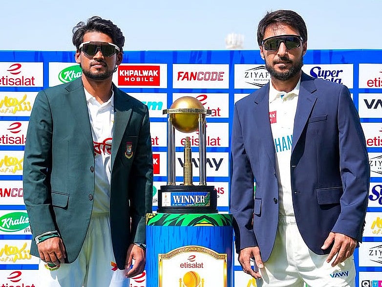 Bangladesh captain Najmul Hossain Shanto and Afghanistan captain Rahmat Shah poses with the trophy.